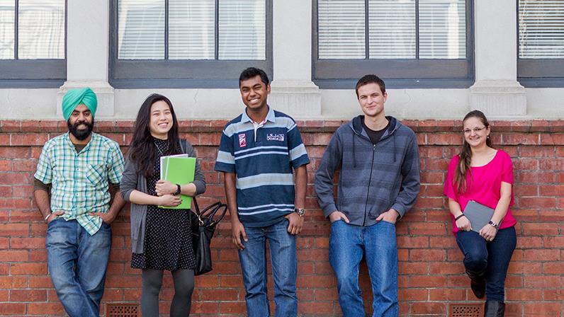 International learners standing outside the Palmerston North campus