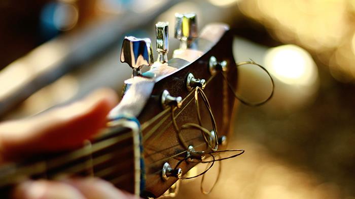 A close-up photograph of a guitar