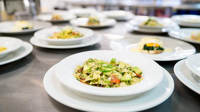 Restaurant meals plated up in a commercial kitchen