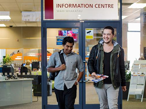 Two people at UCOL's Information Centre