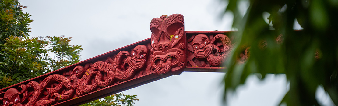 Archway with Māori carvings
