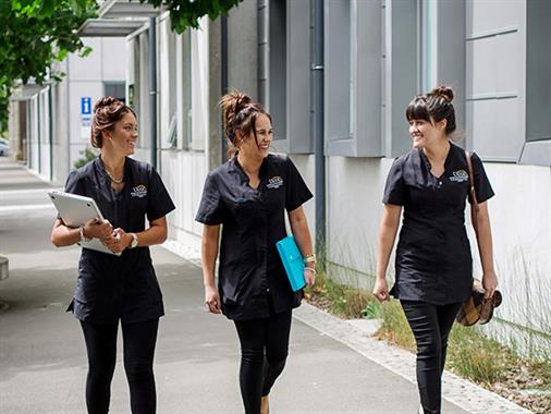 Three UCOL beauty students in uniform