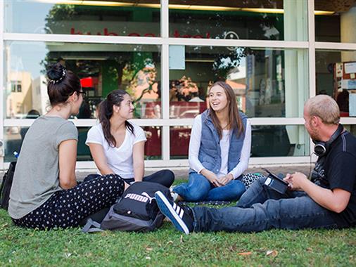 A photo of UCOL Students in from of UCOL Palmerston North Campus