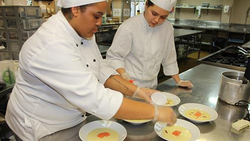 Culinary students plating up