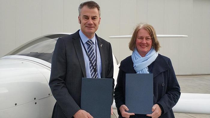 A photograph of New Zealand International Commercial Pilot Academy Chief Executive, Phil Bedford and UCOL Chief Executive Leeza Boyce.