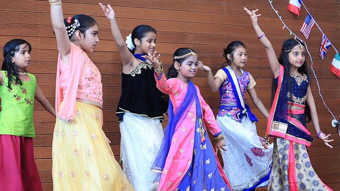 Flavour of Cultures veterans Shree Dance Academy dancers dancing a Bollywood dance act.