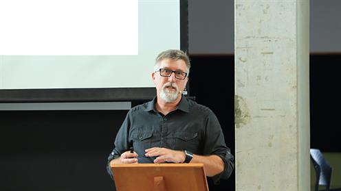 A photograph of UCOL Senior Lecturer Ian Rotherham speaking at an event
