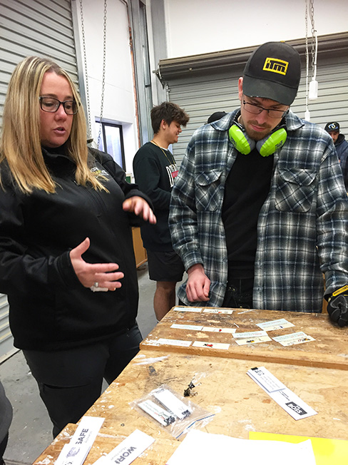WorkSafe New Zealand Inspector Jen O'Donnell speaking with a construction student