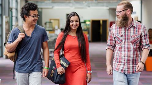 A photograph of some students walking inside the atrium at UCOL in Whanganui