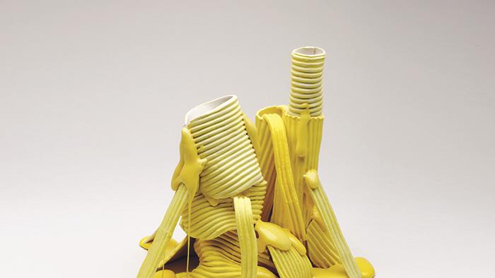 Yellow stack ceramic art work by Andrea du Chatenier