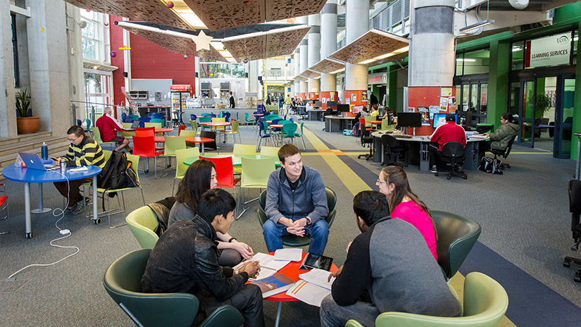 Students chatting in the UCOL | Te Pūkenga Palmerston North campus atrium