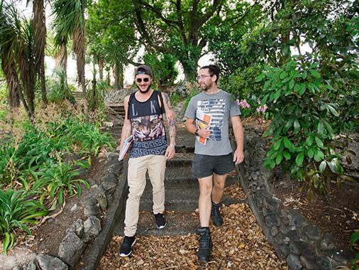 Two students walking in the gardens at UCOL Te Pūkenga in Masterton
