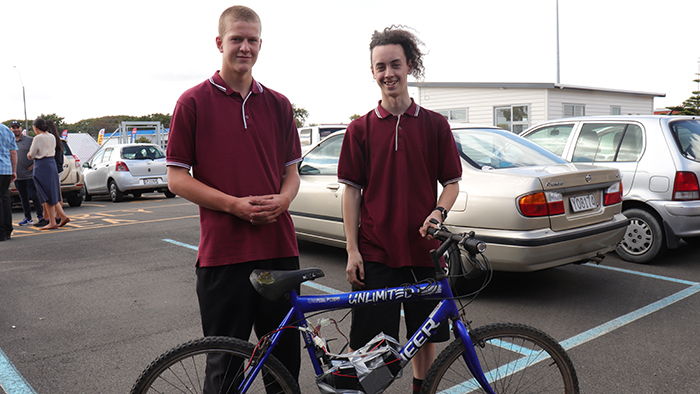 two Queen Elizabeth College students and their award-winning electric bike made at UCOL
