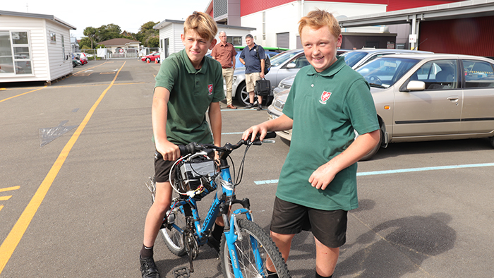two Rangitikei College students with their electric bike made at UCOL