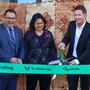 Scott Gibbons cuts opening ribbon as MP Tangi Utikere and Minister of Health Dr Ayesha Verrall look on