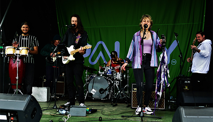 The Ripple Effect band performing on stage