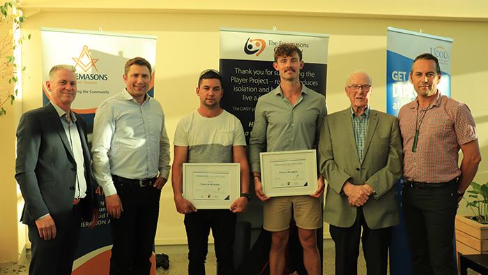 A photograph of UCOL students receiving the Freemasons Willson Lewis Scholarship for qualified tradespeople in the construction industry for  2018.