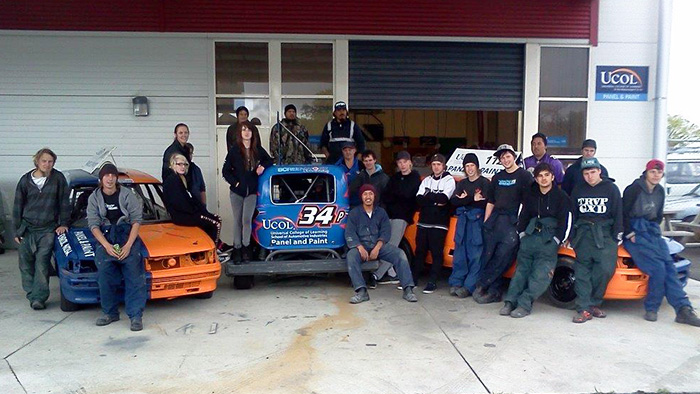 UCOL automotive students with their speedway cars