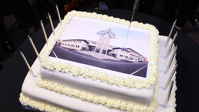 A cake with a photo of the UCOL Palmerston North campus on the top