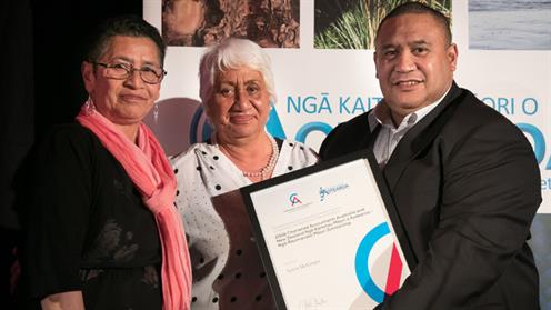 A photograph of UCOL New Zealand Diploma in Business student Aaron McGregor receiving the Ngā Raumanako Māori Scholarship.