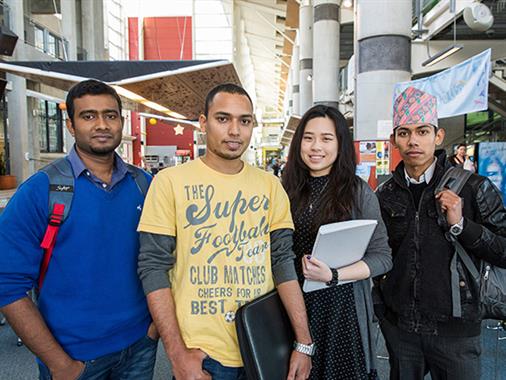 International students from various countries stand in the Palmerston North atrium