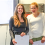 Jessie Howell and Julia Batyrova receive their scholarships