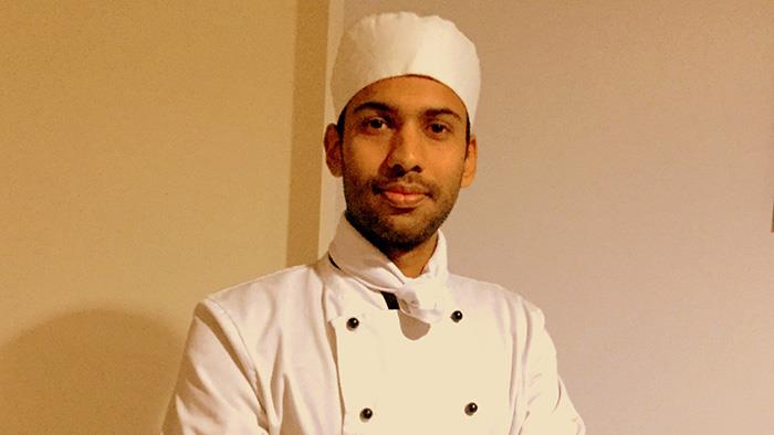 UCOL Cookery Graduate Sajin Joseph in his chef uniform.