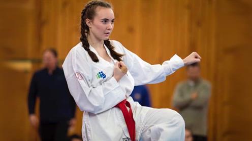 A photograph of UCOL Student Bree Hooper-Whiti performing Taekwon-Do.