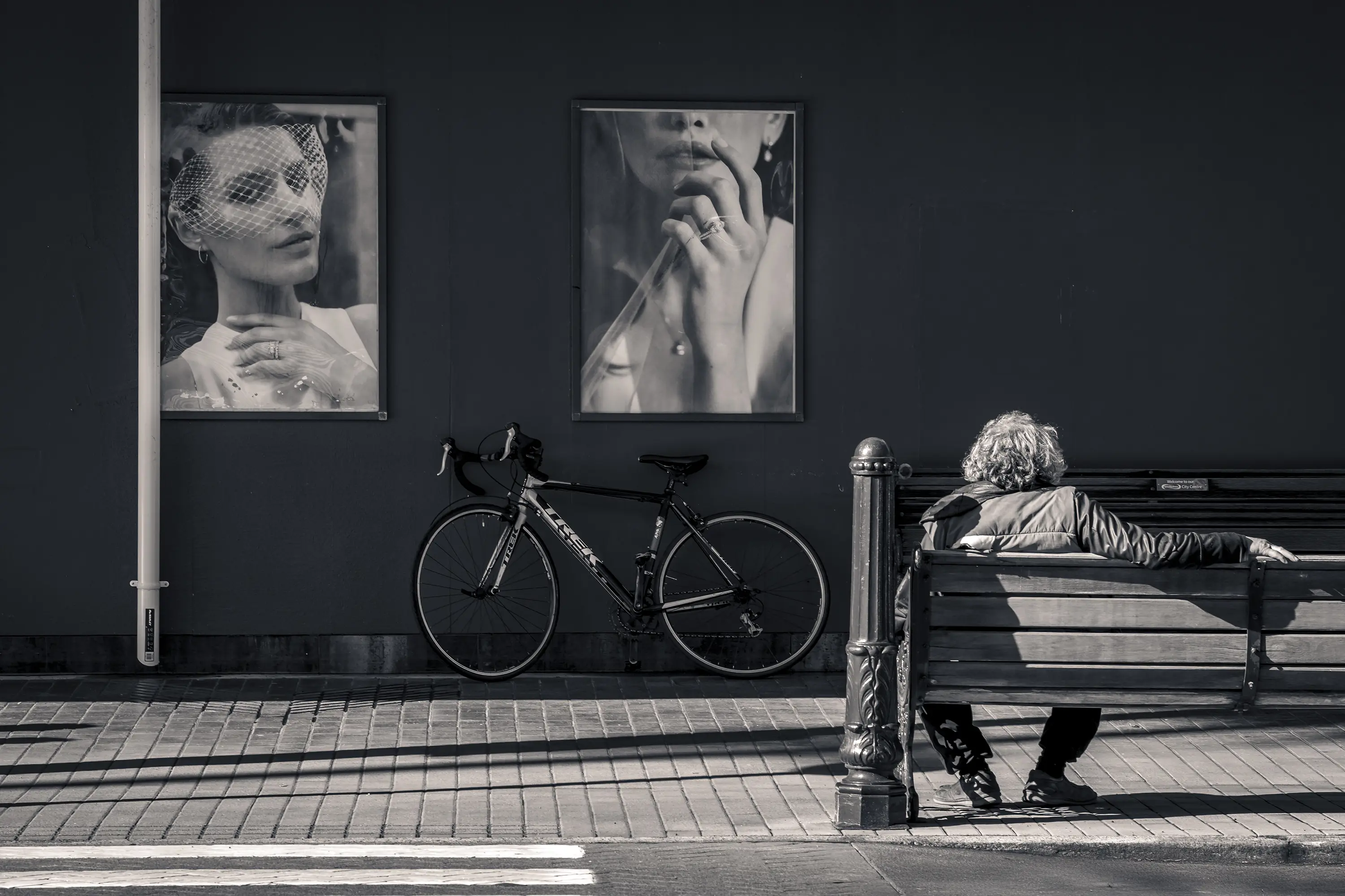 a person sitting on a bench