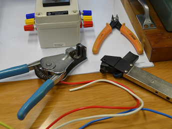 Electrical tools on a wooden table