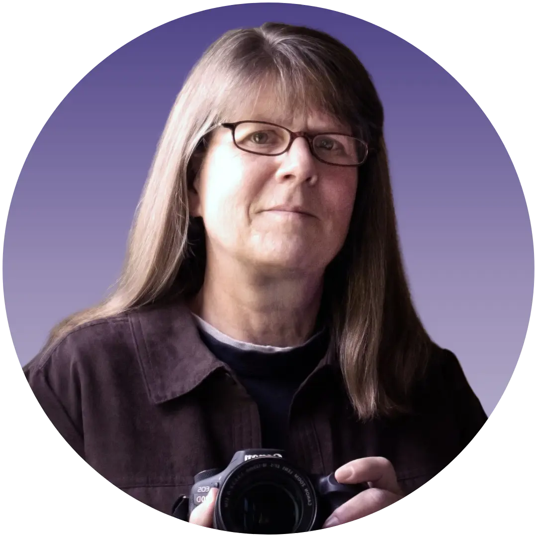 a woman holding a camera
