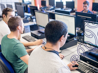 Students working on computers