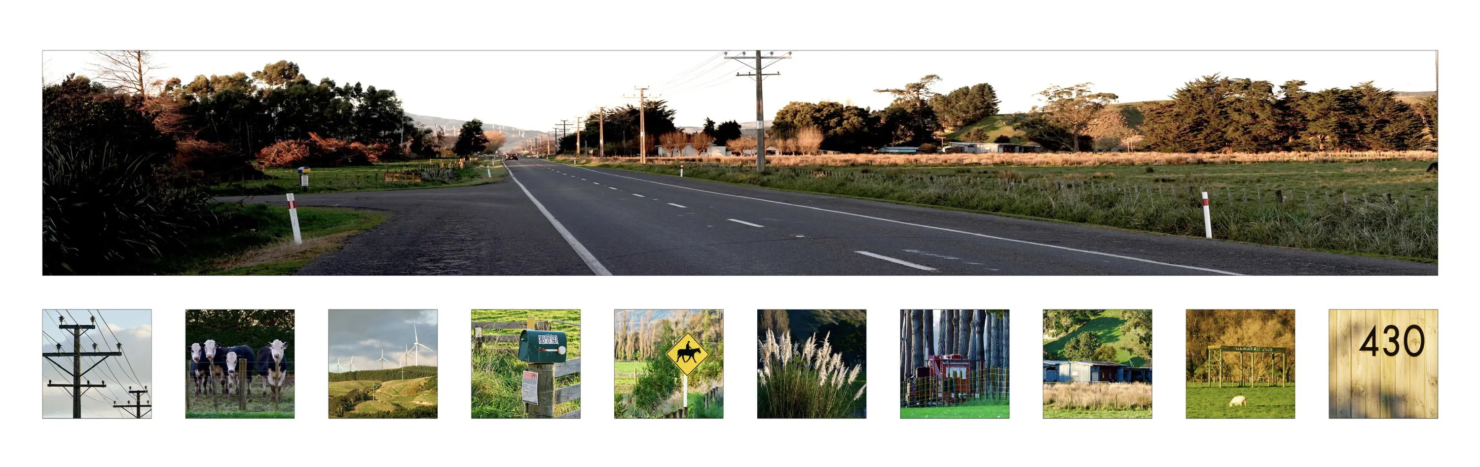 a road with a sign and a post box