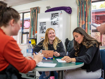 An early childhood class where students are interacting with the teacher