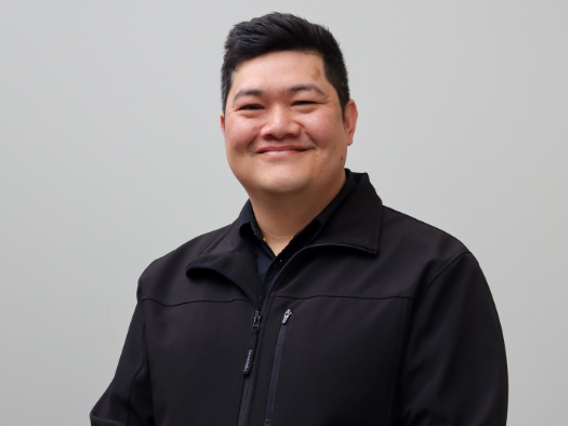 a man in a black jacket