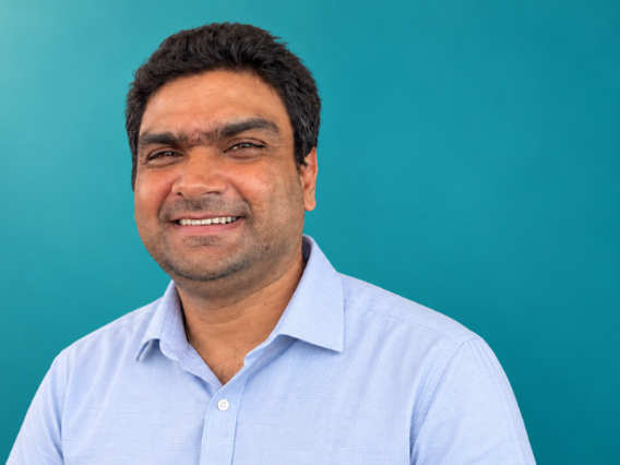a man smiling for the camera