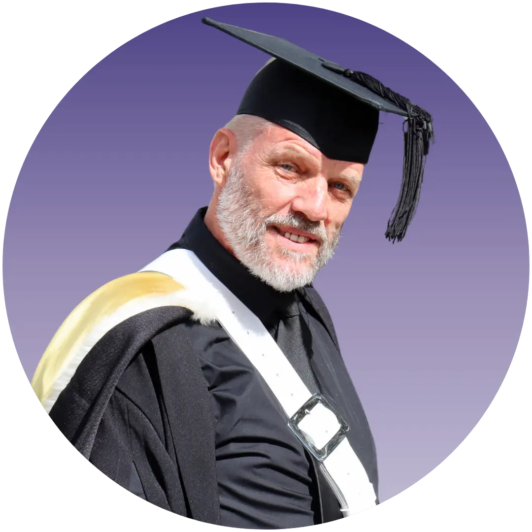 a man in a graduation gown
