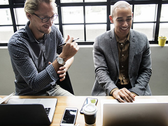 Two guys in a business meeting.