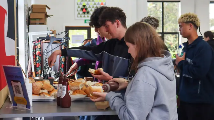 a group of people eating food
