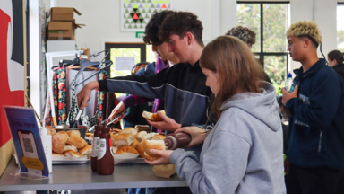 a group of people eating food
