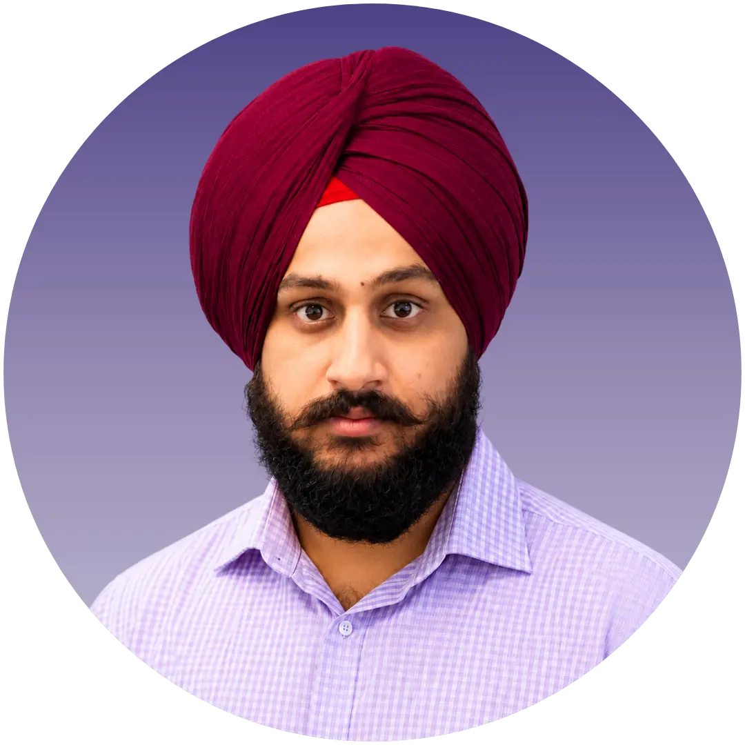 a man with a beard wearing a turban