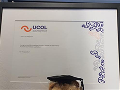 UCOL graduation branded frame