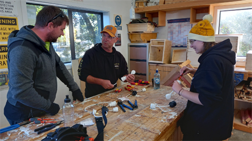 Dillan Wyse from McKenzies Electrical 2000 teaches practical skills to Aaron Middleton and Caitlyn Wilkins. Dillan Wyse from McKenzies Electrical 2000 teaches practical skills to Aaron Middleton and Caitlyn Wilkins.