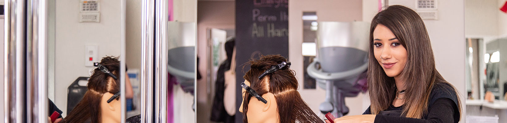 A student applying makeup